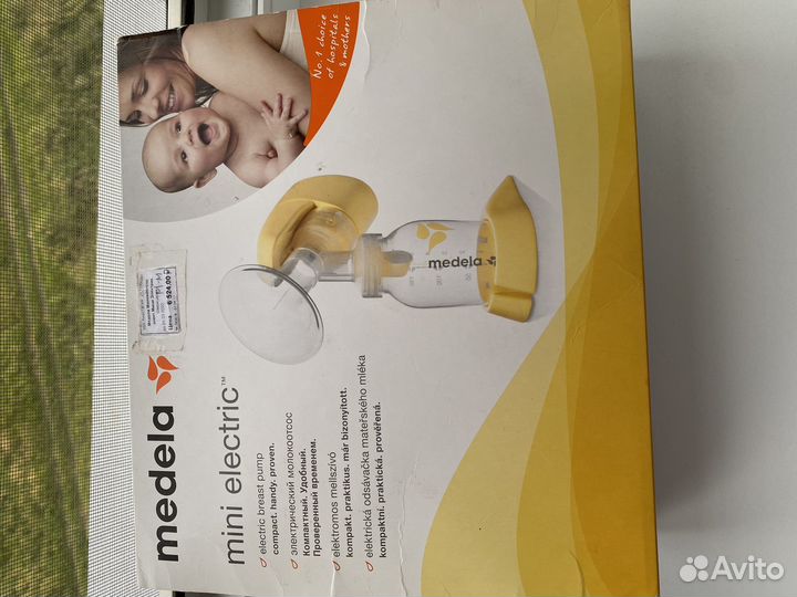 Молокоотсос medela электрический