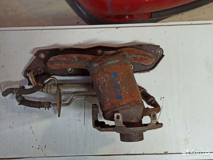 Выпускной коллектор Toyota Corolla Fielder nze 144