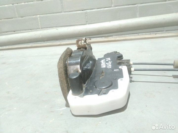 Замок боковой двери задний левый Nissan Almera