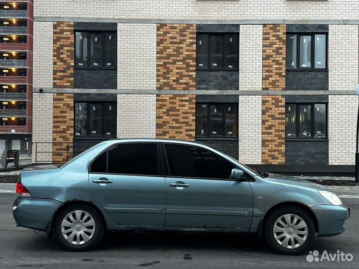 Mitsubishi Lancer 1.6 МТ, 2006, 289 000 км