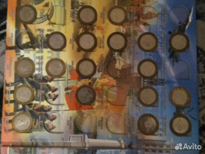 Продам альбом с юбилейными монетами России