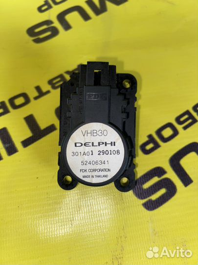 Моторчик заслонки отопителя Opel Astra H