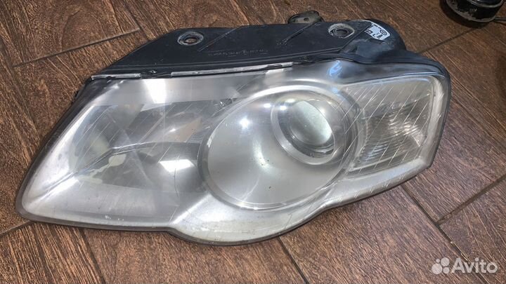Фара левая Volkswagen Passat B6