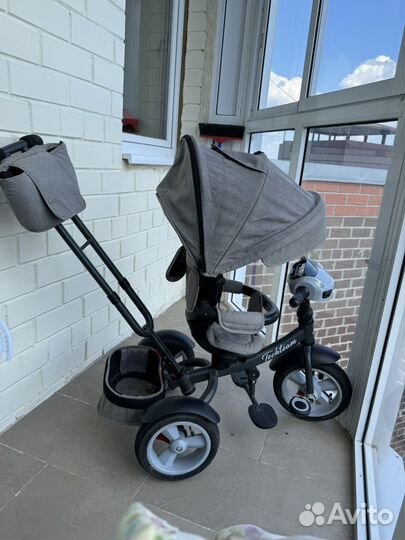 Детский трехколесный велосипед с ручкой