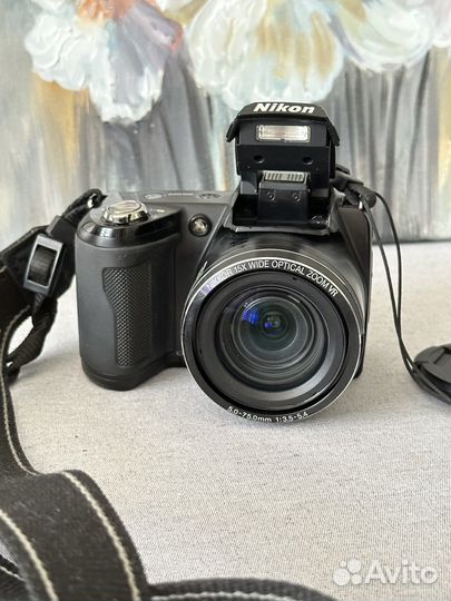 Зеркальный фотоаппарат Nikon Coolpix L110