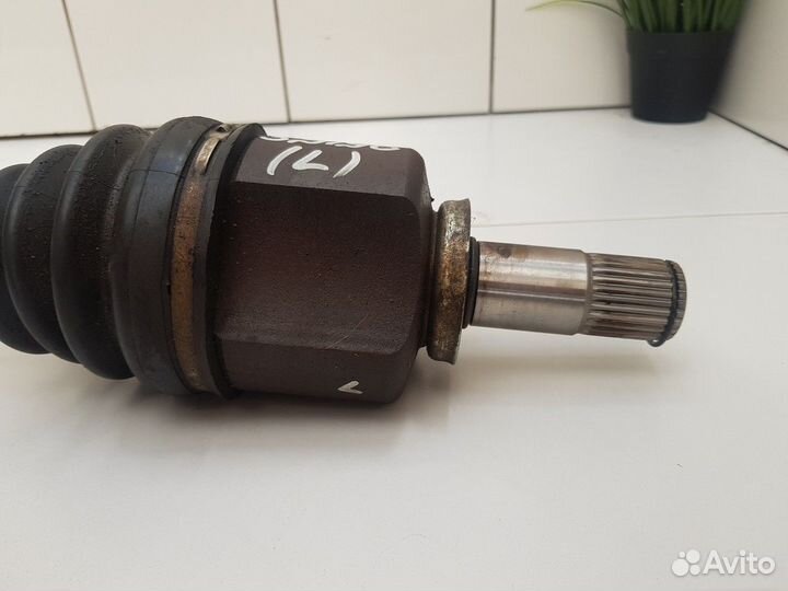 Полуось (привод) левый (Geely Atlas)