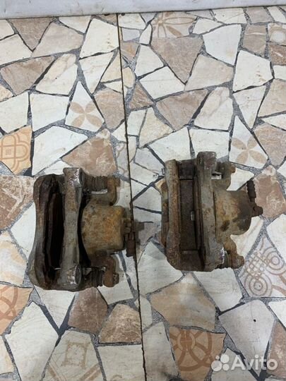 Суппорт тормозной Nissan Teana J32