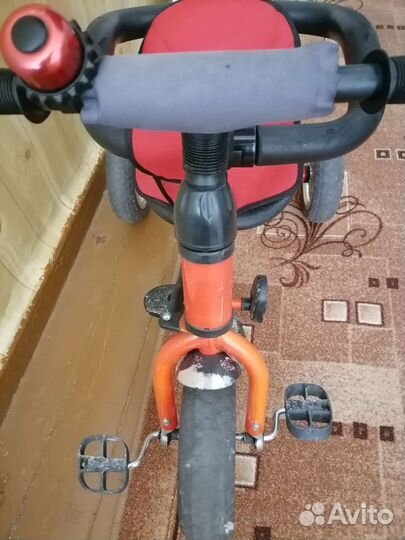 Трехколесный велосипед с ручкой