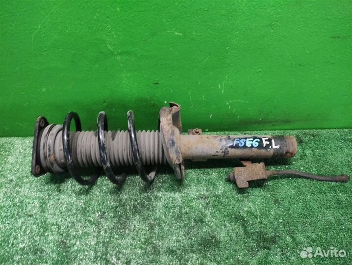 Стойка амортизатора передняя левая Mazda 3 (BK) 2