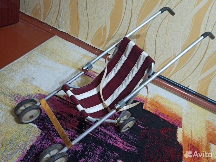 Игрушечная коляска для кукол