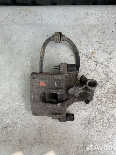 Суппорт зад. левый Mazda 3 BL