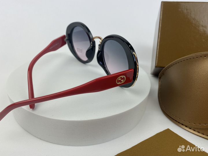 Солнцезащитные очки Gucci