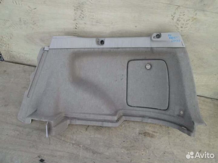 Обшивка багажника правая Toyota Corolla Fielder