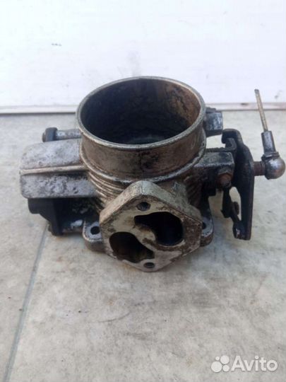 Дроссельная заслонка Opel Omega B 90411550