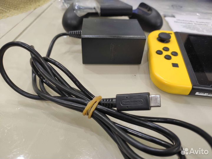 Продам прошитую Nintendo Switch и много игр