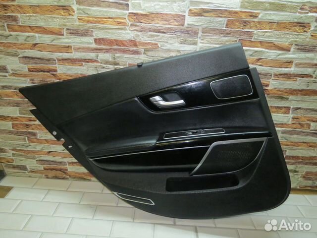 Обшивка задней левой двери Kia Quoris