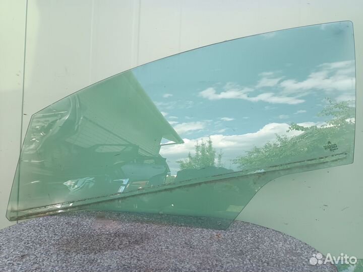 Стекло двери передней левой Ситроен Citroen-Peugeo
