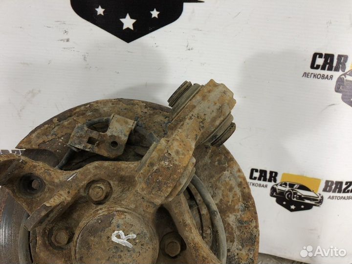 Кулак поворотный задний правый R Kia Magentis