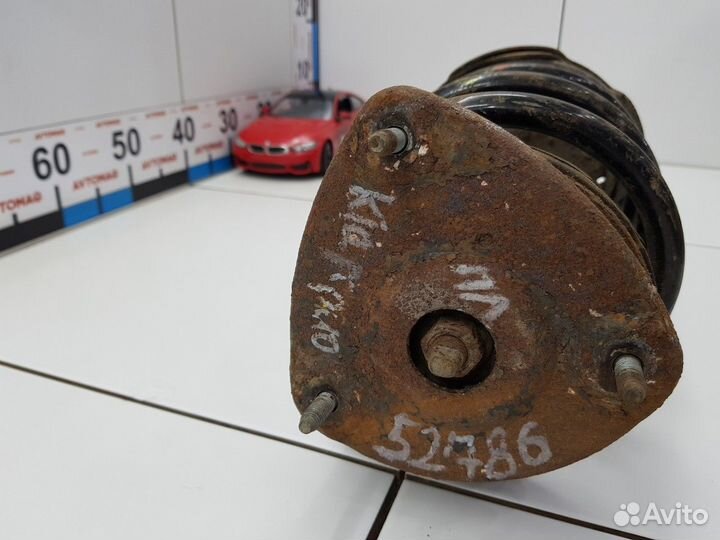 Амортизатор передний левый с пружиной (Kia Rio)