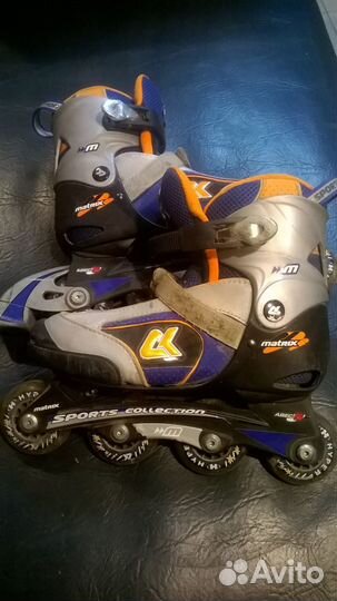 Роликовые коньки