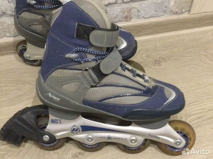 Роликовые коньки