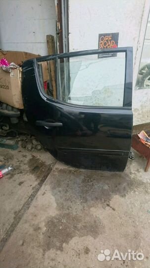 Дверь задняя правая в сборе Митсубиси Л200 L 200