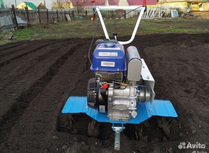 Вспашка земли мотоблоком