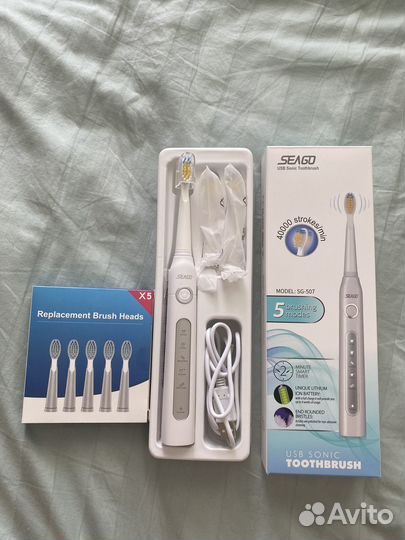 Электрическая зубная щетка