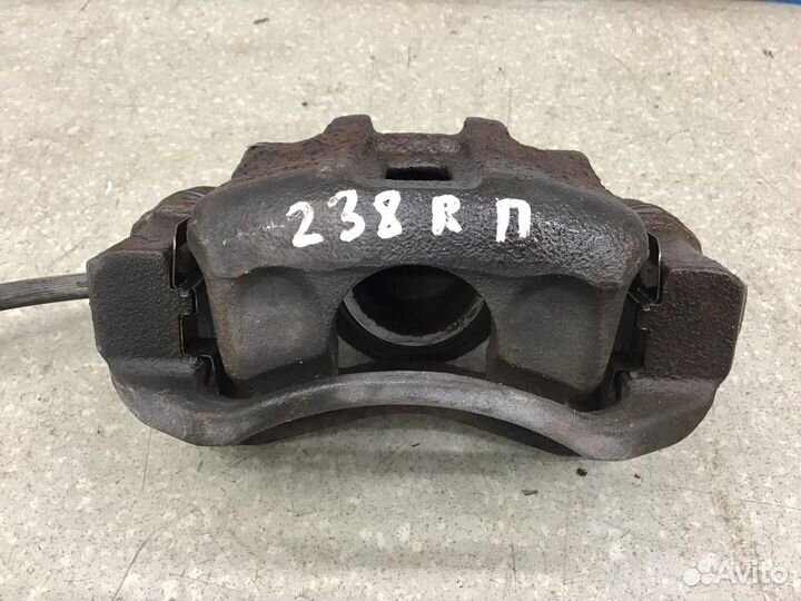 Суппорт передний правый Kia RIO 2005-2011