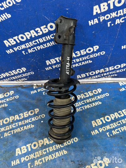 Передняя левая стойка амортизатора Opel Astra Gtc