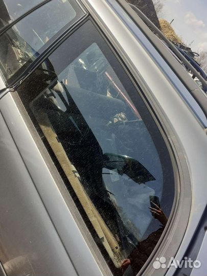 Заднее левое стекло Opel Omega B универсал