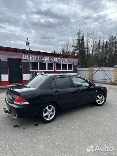 Mitsubishi Lancer 1.6 МТ, 2006, 310 000 км