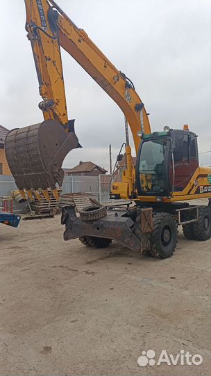 Полноповоротный экскаватор колесный