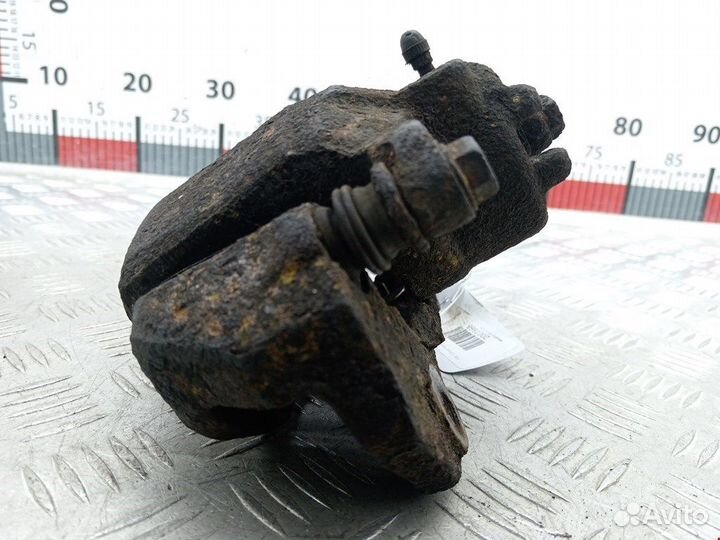 Суппорт передний правый Mitsubishi Lancer 9