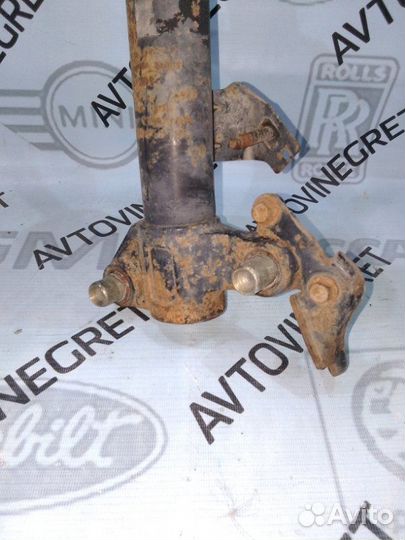 Стойка амортизатор передняя левая Nissan Primera