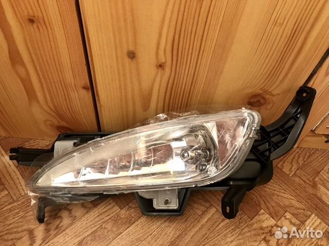 Левая противотуманная фара KIA