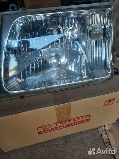 Фара левая оригинал Toyota Land Cruiser 100