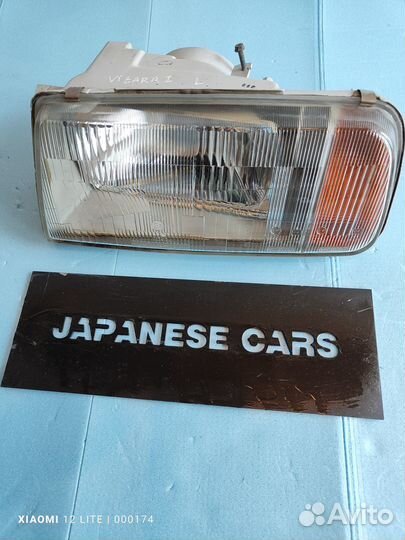 Фара сторона L Suzuki Grand Vitara