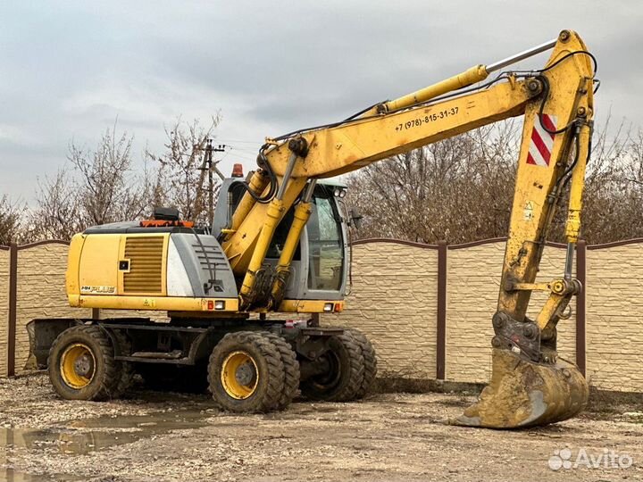 Колёсный экскаватор New Holland MH Plus, 2005