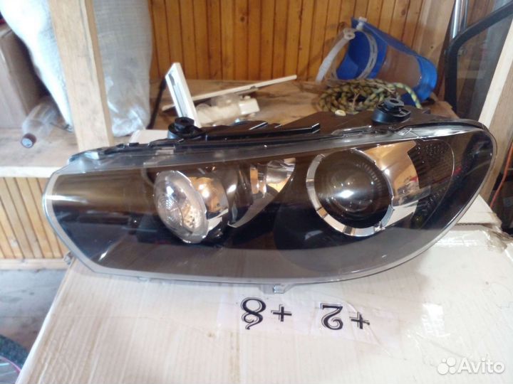 Фара левая Volkswagen Scirocco 3 xenon до рест