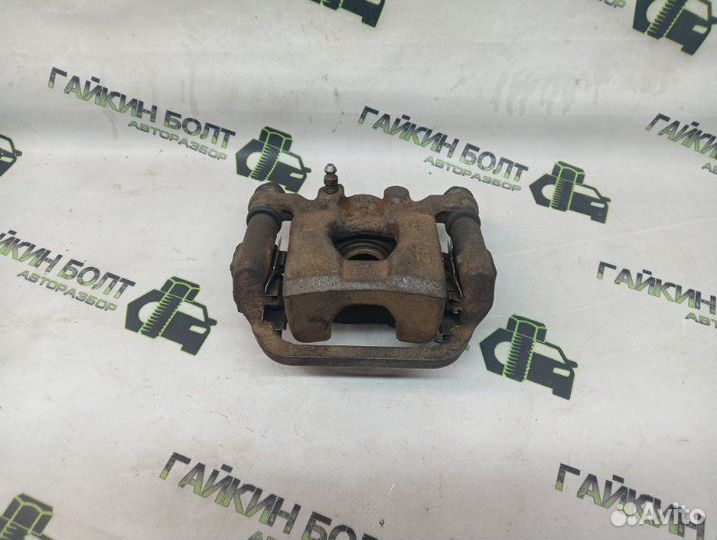 Суппорт тормозной задний правый Nissan Qashqai J10