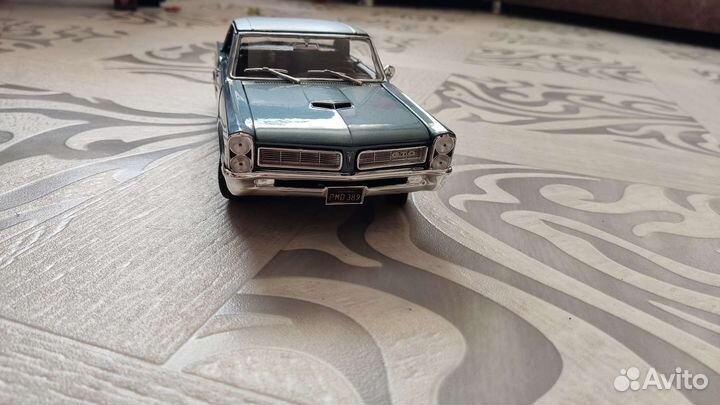 Модель автомобиля 1:18 Pontiac GTO 1965