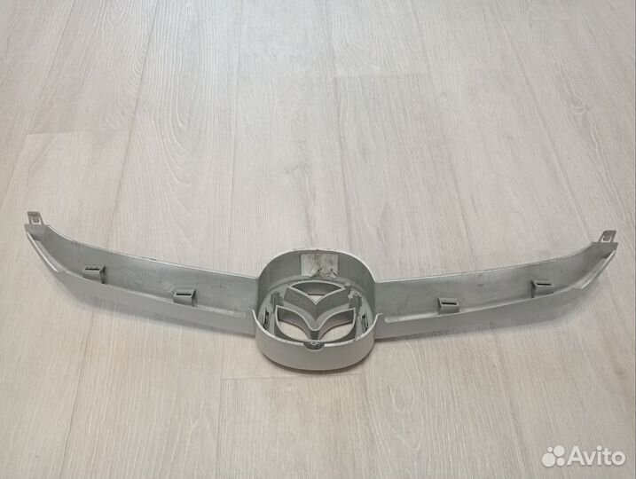 Эмблема решетки Мазда 5 CR
