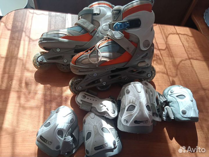 Роликовые коньки