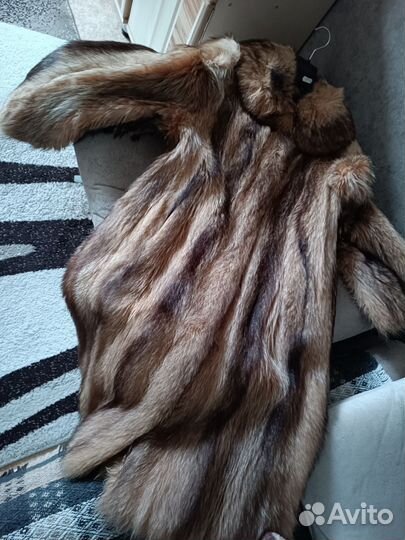 Женские шубы из енота