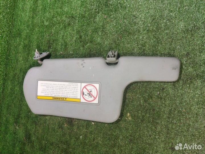 Козырек солнцезащитный правый Nissan Almera