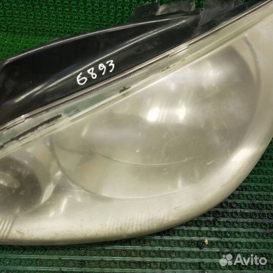 Фара левая Hyundai Getz рест. 2009 921011C501