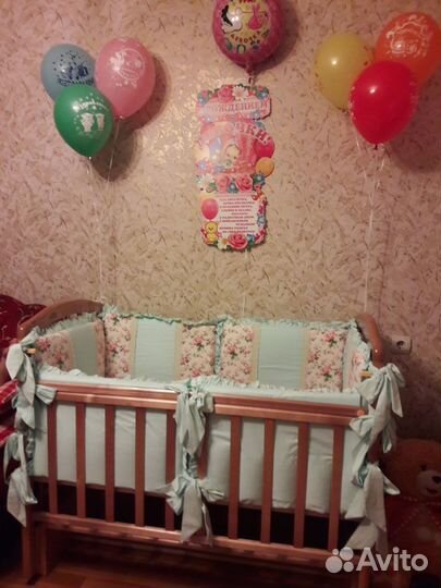 Детская кроватка с продольным маятником