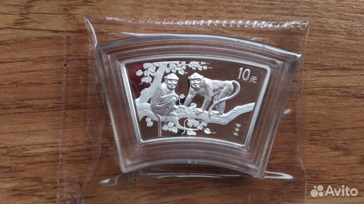 Серебряные монеты(веер) лунного календаря Китай