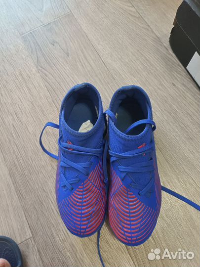 Детские футбольные бутсы predators